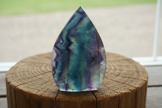 Teardrop-shaped Rainbow Fluorite crystal (front)